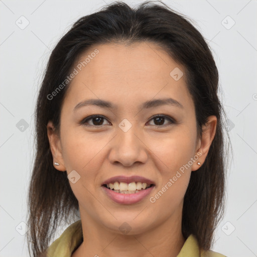 Joyful white young-adult female with long  brown hair and brown eyes