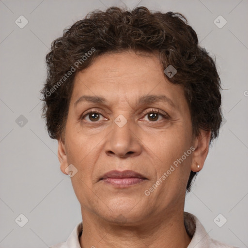 Joyful white adult female with short  brown hair and brown eyes