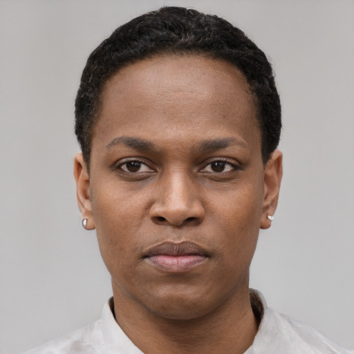 Neutral latino young-adult female with short  black hair and brown eyes