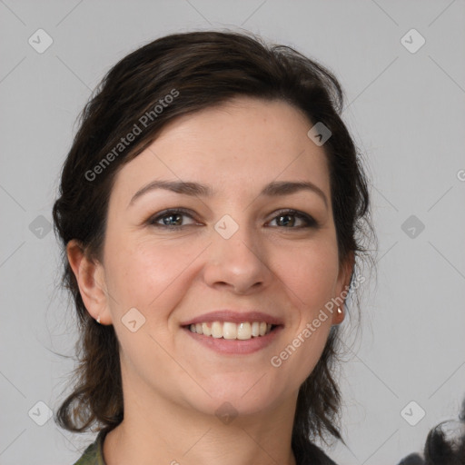 Joyful white young-adult female with medium  brown hair and grey eyes