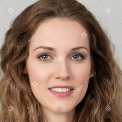 Joyful white young-adult female with long  brown hair and green eyes