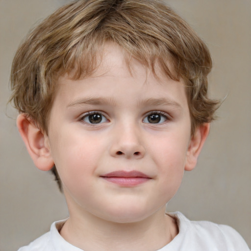 Joyful white child male with short  brown hair and brown eyes