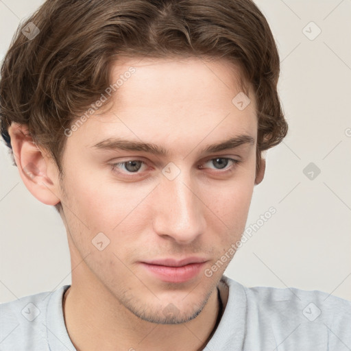 Neutral white young-adult male with short  brown hair and grey eyes