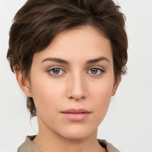 Neutral white young-adult female with short  brown hair and brown eyes