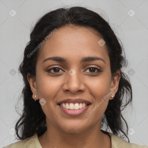 Joyful latino young-adult female with long  brown hair and brown eyes