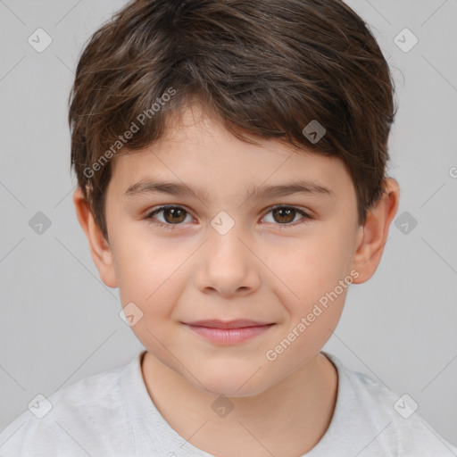 Joyful white child male with short  brown hair and brown eyes