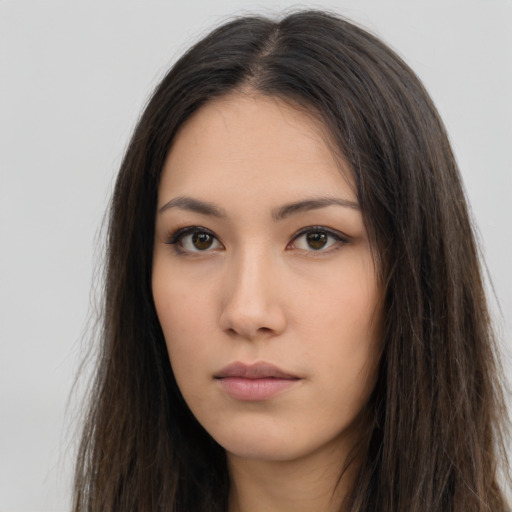 Neutral asian young-adult female with long  brown hair and brown eyes