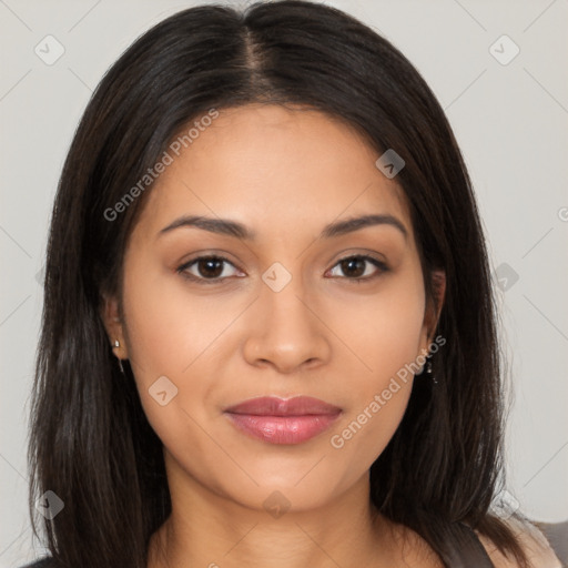 Joyful latino young-adult female with long  brown hair and brown eyes