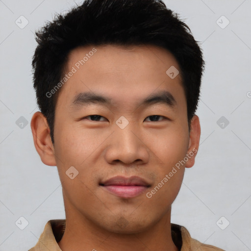 Joyful asian young-adult male with short  black hair and brown eyes