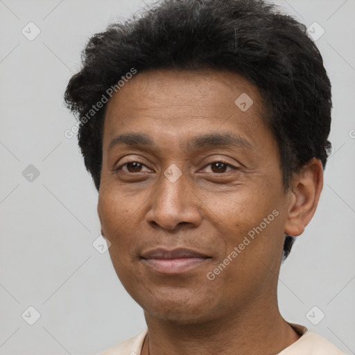 Neutral latino adult male with short  black hair and brown eyes