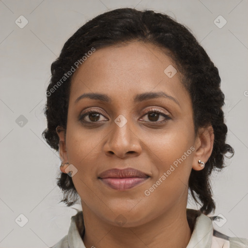 Joyful black young-adult female with medium  brown hair and brown eyes