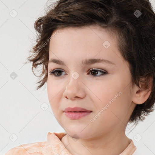 Joyful white child female with medium  brown hair and brown eyes