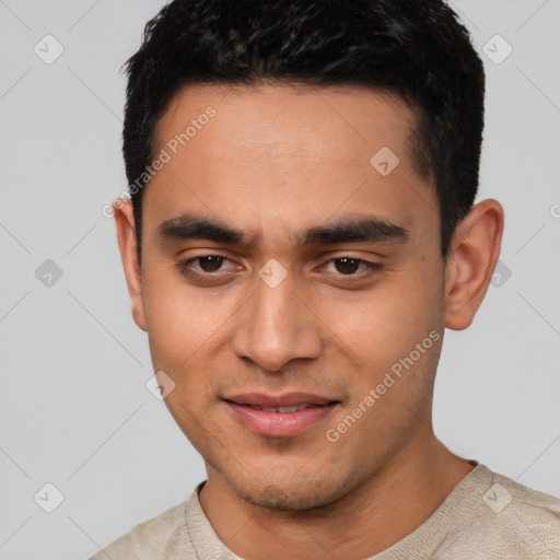 Joyful latino young-adult male with short  black hair and brown eyes