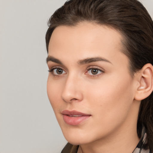 Neutral white young-adult female with medium  brown hair and brown eyes