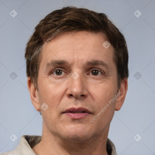 Neutral white adult male with short  brown hair and brown eyes