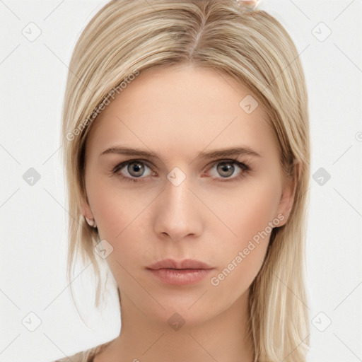 Neutral white young-adult female with long  brown hair and brown eyes