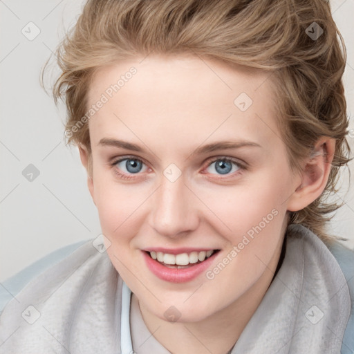 Joyful white child female with medium  brown hair and blue eyes