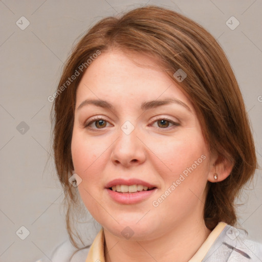 Joyful white young-adult female with medium  brown hair and blue eyes