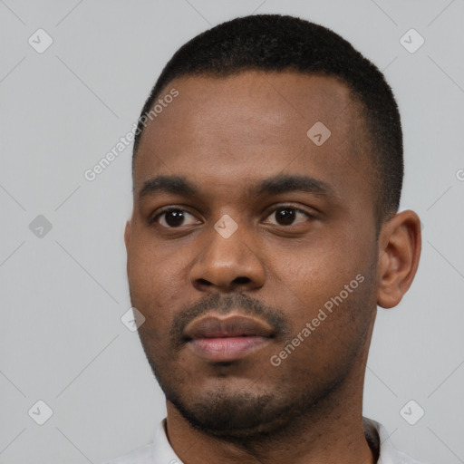 Neutral black young-adult male with short  black hair and brown eyes