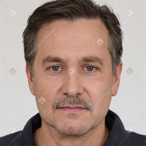 Neutral white adult male with short  brown hair and brown eyes