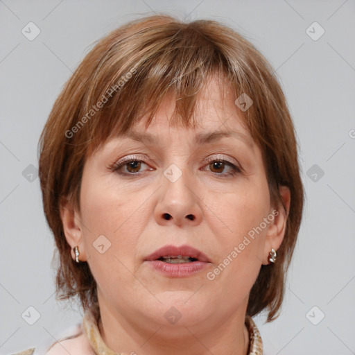 Joyful white adult female with medium  brown hair and blue eyes