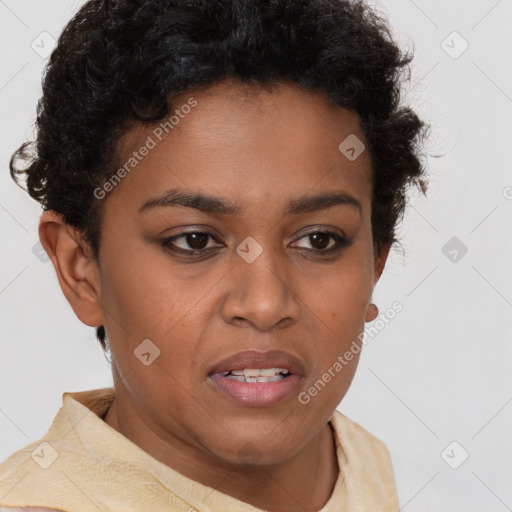 Joyful black young-adult female with short  brown hair and brown eyes