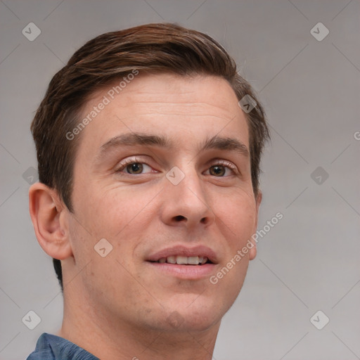 Joyful white adult male with short  brown hair and grey eyes