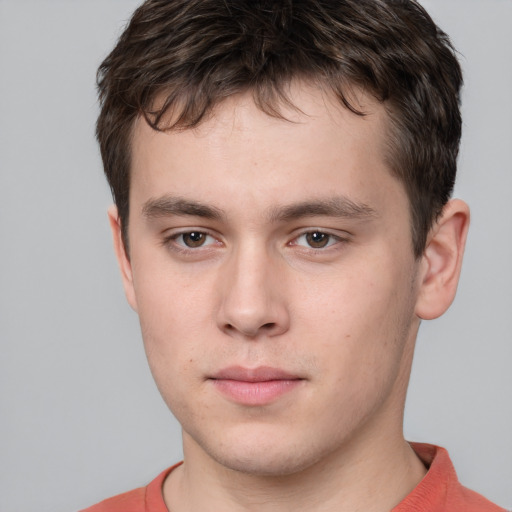 Neutral white young-adult male with short  brown hair and brown eyes