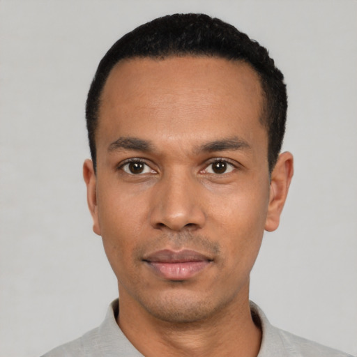 Neutral black young-adult male with short  black hair and brown eyes