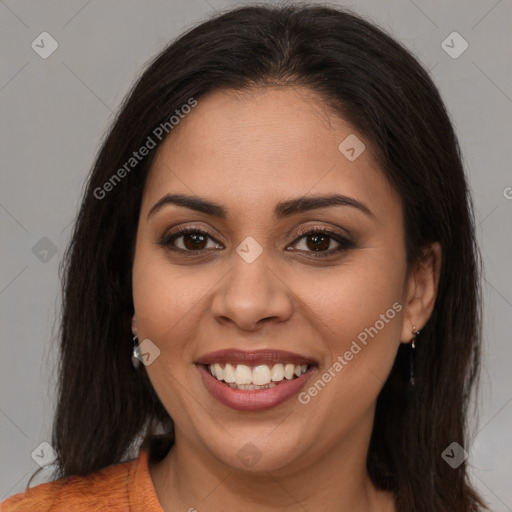 Joyful latino young-adult female with long  brown hair and brown eyes