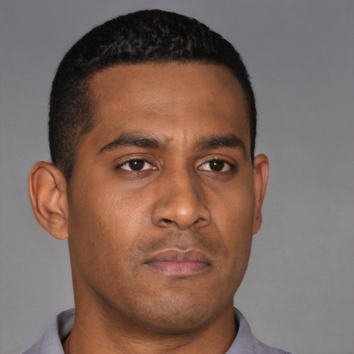 Neutral latino young-adult male with short  brown hair and brown eyes