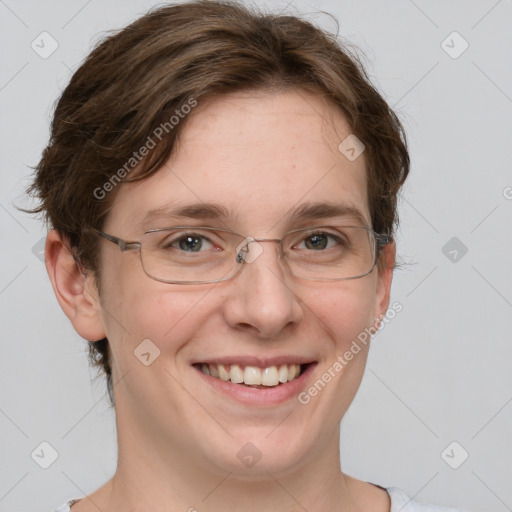 Joyful white adult female with short  brown hair and grey eyes