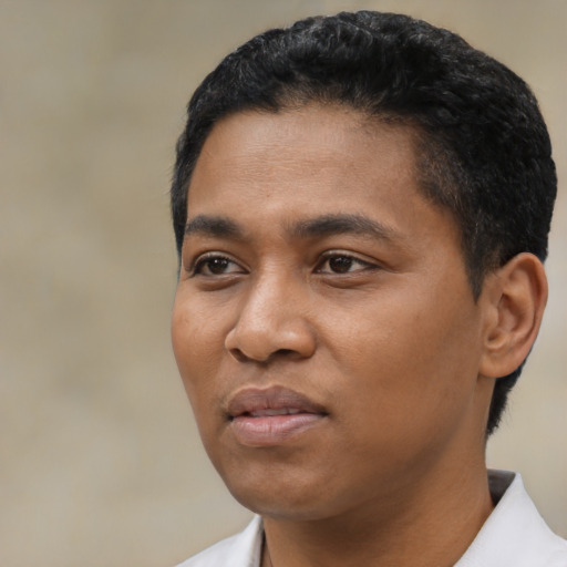 Neutral black young-adult male with short  black hair and brown eyes