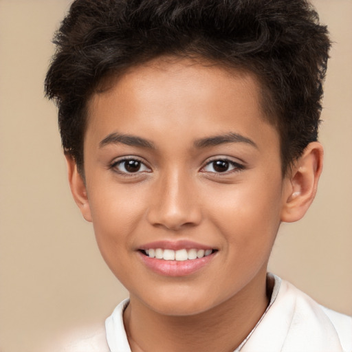 Joyful white child female with short  brown hair and brown eyes