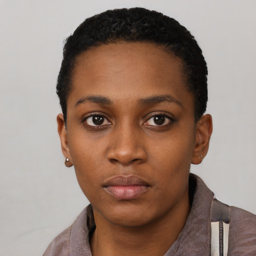 Neutral black young-adult female with short  black hair and brown eyes