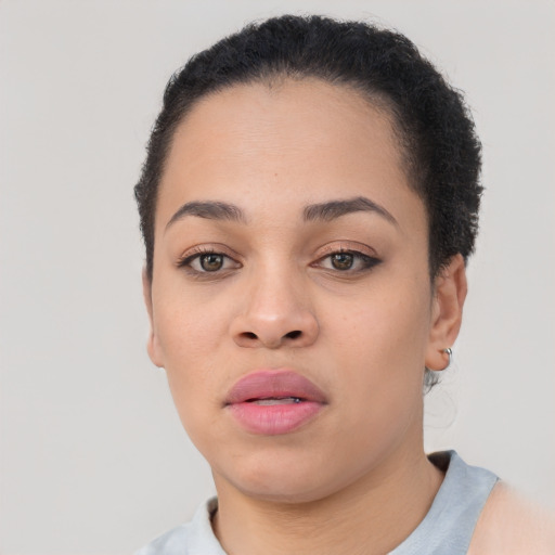 Neutral latino young-adult female with short  brown hair and brown eyes