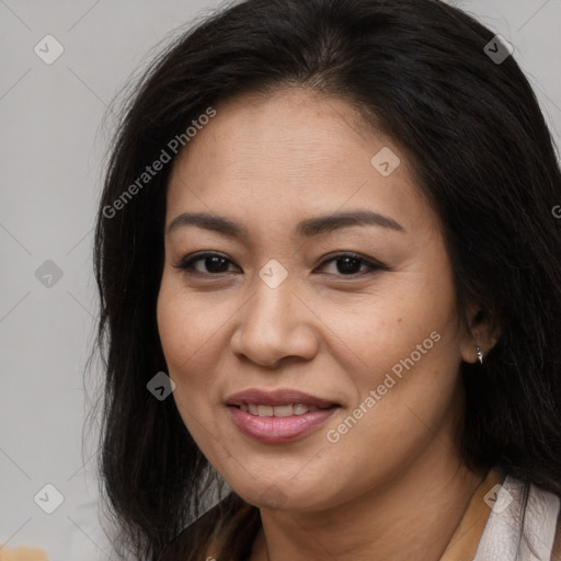 Joyful asian young-adult female with long  brown hair and brown eyes