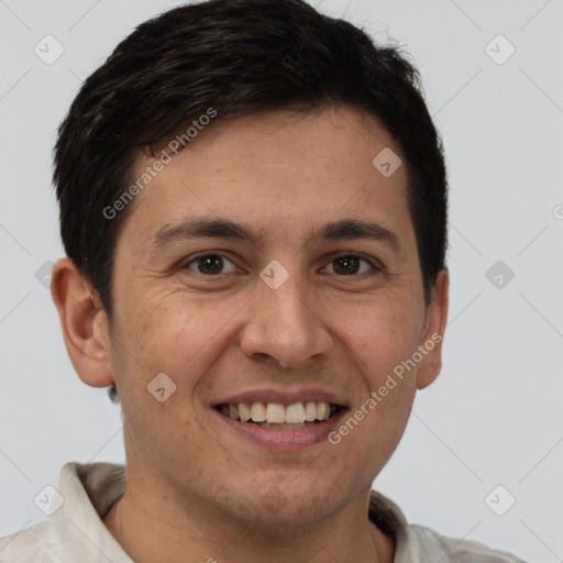 Joyful white adult male with short  brown hair and brown eyes