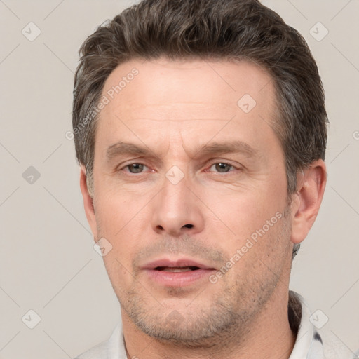 Neutral white adult male with short  brown hair and brown eyes