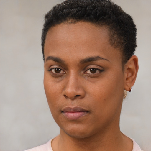 Neutral black young-adult female with short  brown hair and brown eyes