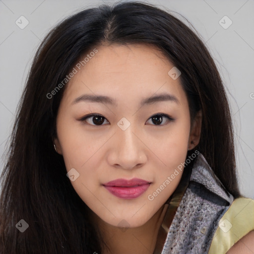 Joyful asian young-adult female with long  brown hair and brown eyes