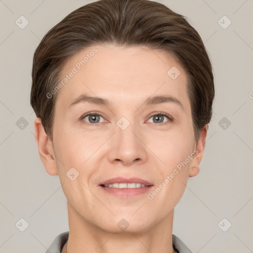 Joyful white young-adult female with short  brown hair and grey eyes