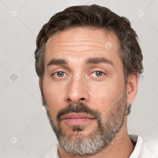 Neutral white adult male with short  brown hair and brown eyes