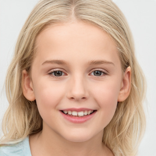 Joyful white child female with long  brown hair and brown eyes