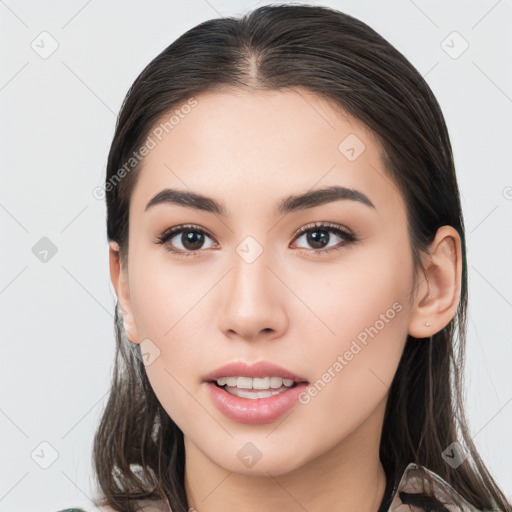 Joyful white young-adult female with long  brown hair and brown eyes