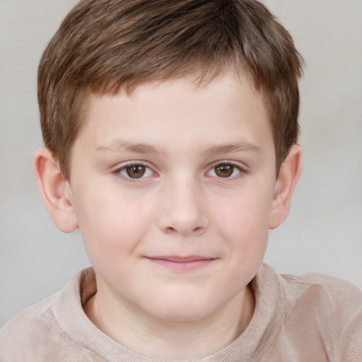 Joyful white child male with short  brown hair and grey eyes