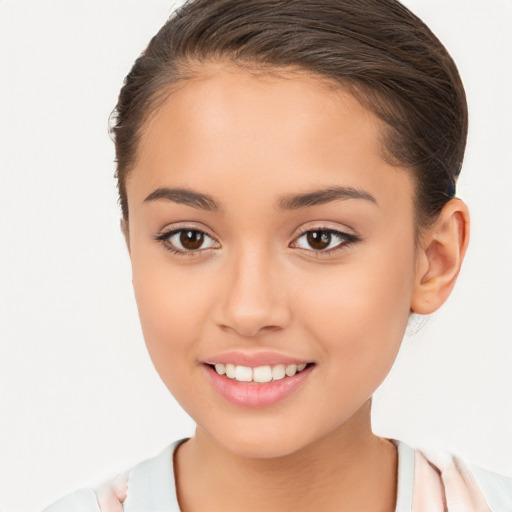 Joyful white child female with medium  brown hair and brown eyes