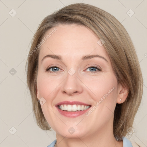 Joyful white young-adult female with medium  brown hair and blue eyes