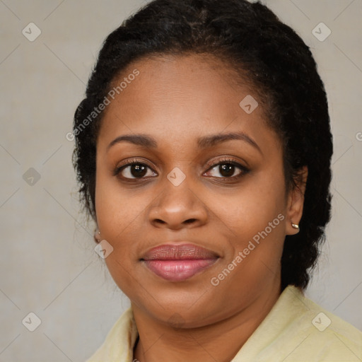 Joyful black young-adult female with medium  brown hair and brown eyes