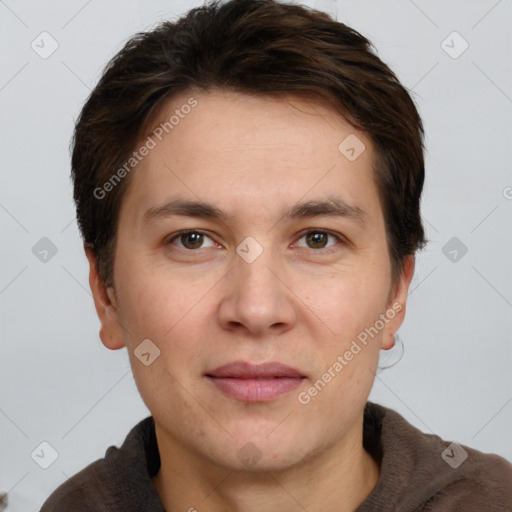 Joyful white adult male with short  brown hair and brown eyes